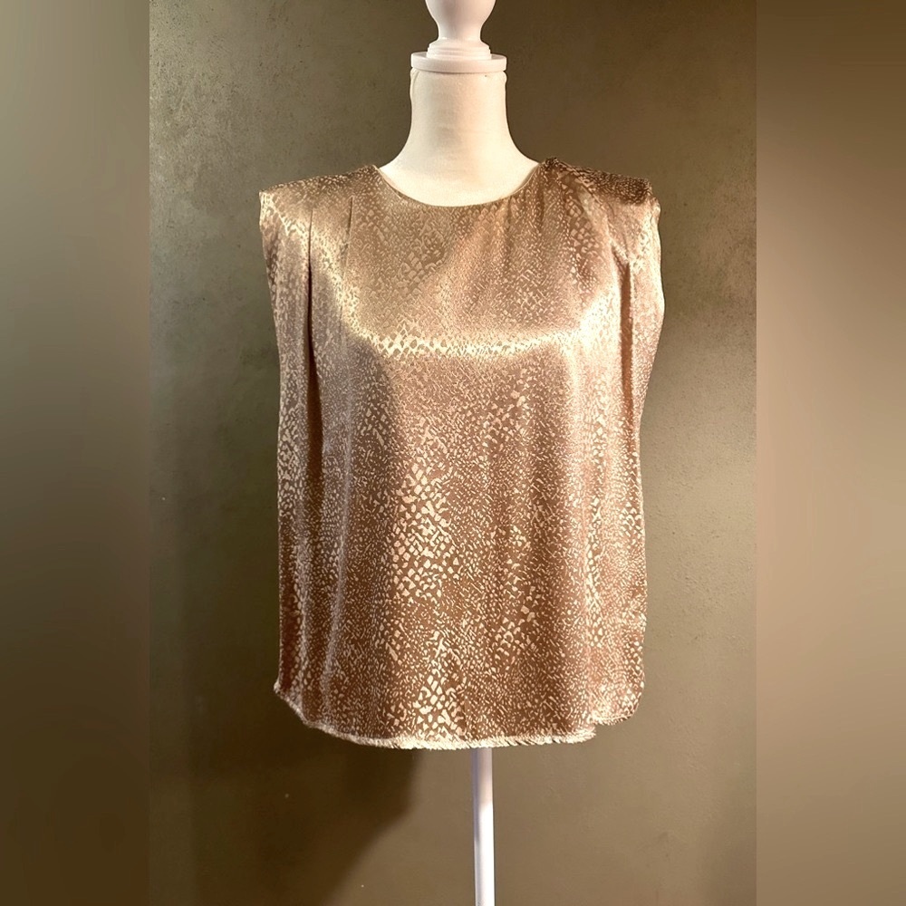 Gold short sleeve top with box pleates at shoulders, shoulder pads, lined